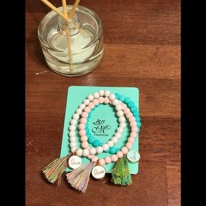Three ceramic LOVE tassel bracelets